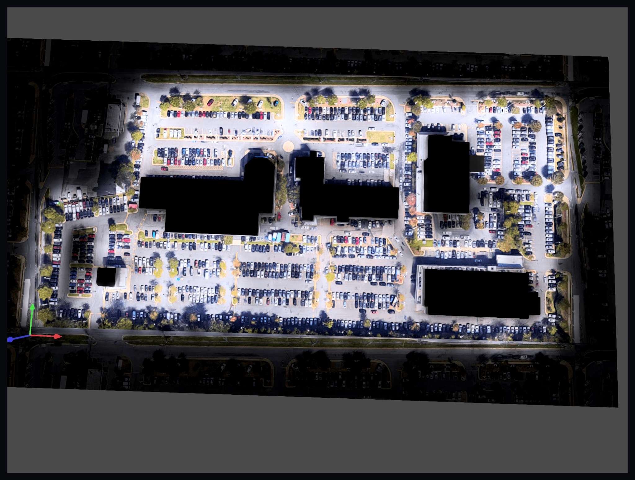 Car dealership photometric plan 3D overview showing illuminated vehicle display lots and dealership buildings