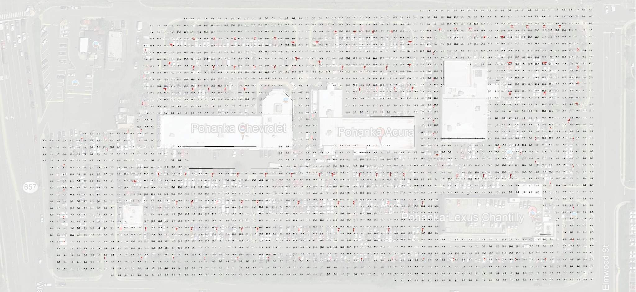 Car dealership photometric plan with point-by-point foot-candle values across the full vehicle display site
