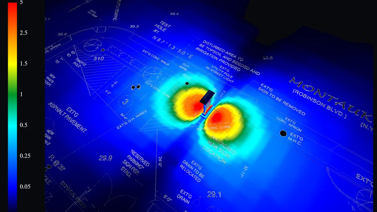False-color site analysis showing illumination distribution around a monument sign